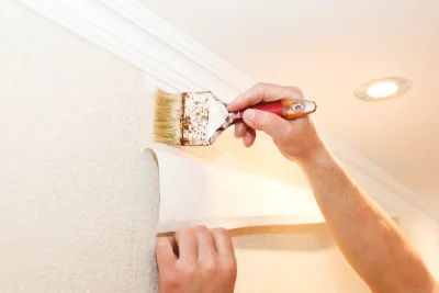 Pose de papier peint à Souvigné — revêtements muraux et toiles de verre